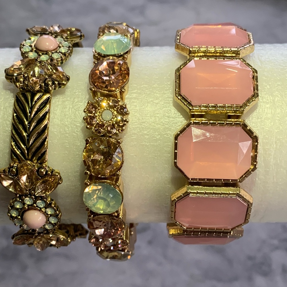 Set of three costume stretch bracelets.